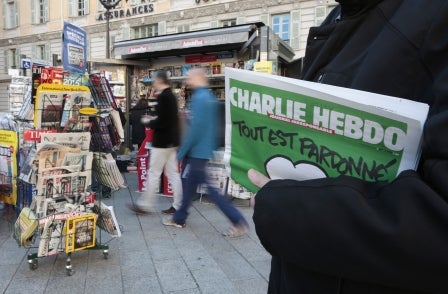 Readers queue from early hours for 1,000 UK editions of Charlie Hebdo magazine